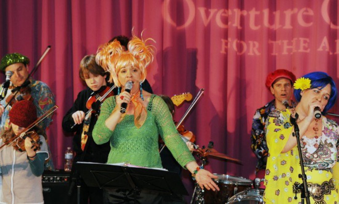 Children's band with colorful hair and costumes