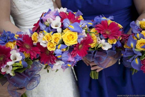 Bride and bridesmaids with colorful flowers